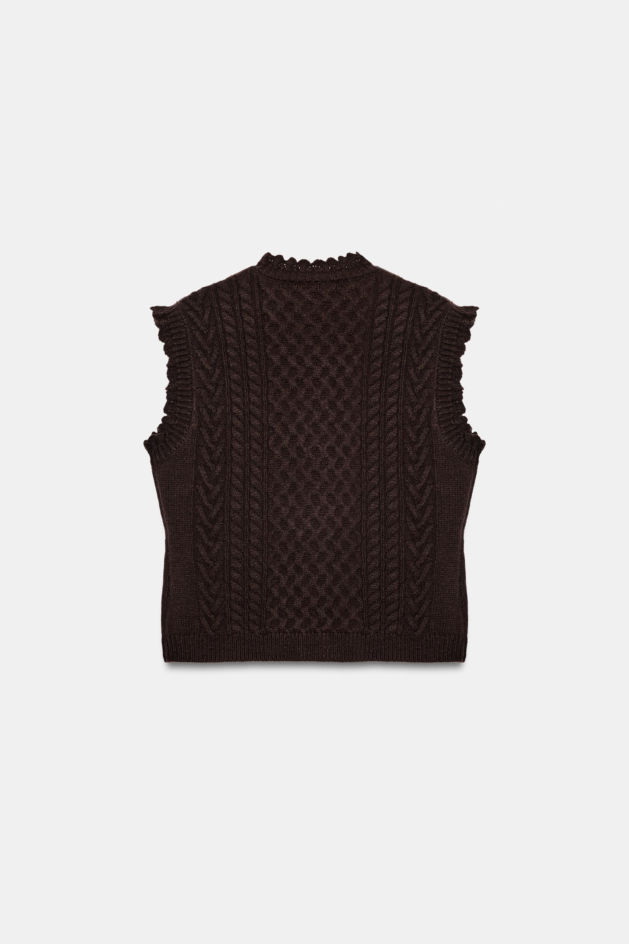 GILET EN MAILLE TORSADÉE À VOLANTS